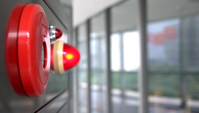 Close-up of a fire alarm system component